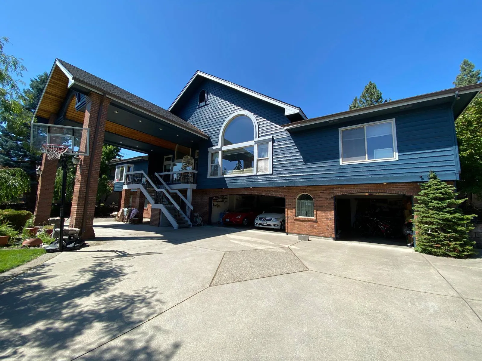 Modern home exterior with clean two-tone paint scheme and painted trim details